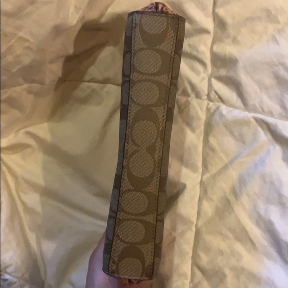 Brand new without tags Coach coral clutch